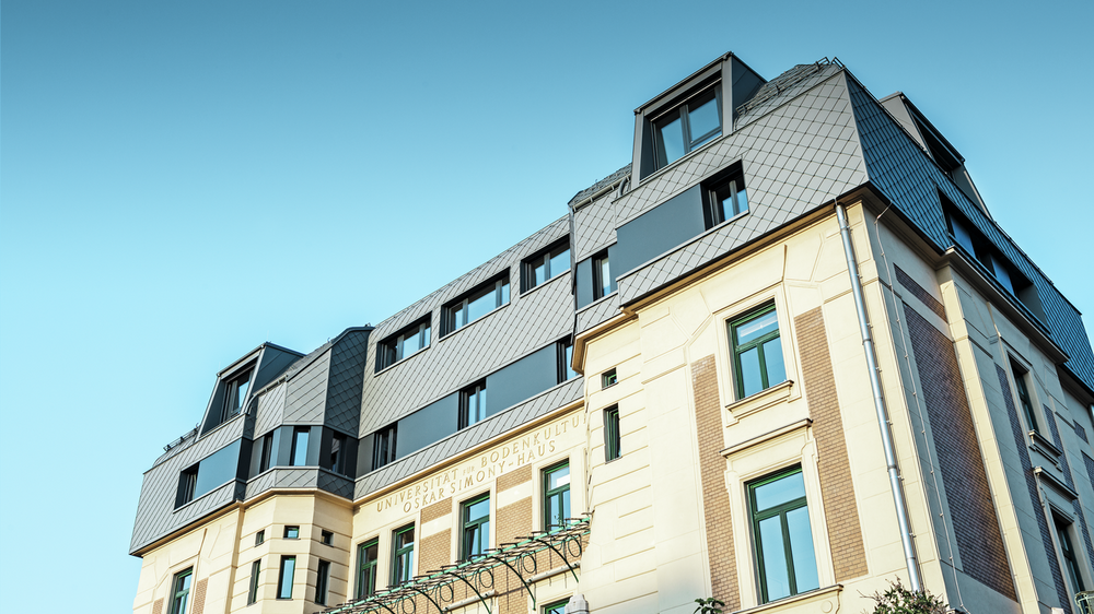 BOKU University Vienna with the rhomboid roof and façade tile 29 × 29 in P.10 light grey