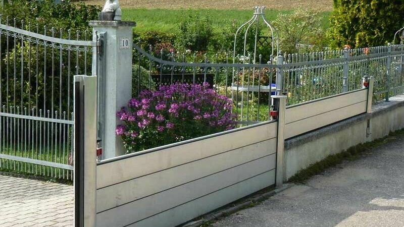 House driveway protected against flooding with PREFA flood protection 